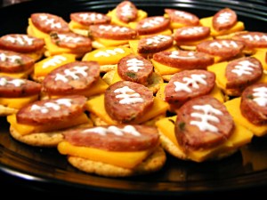 Now these have pepperoni shaped footballs, cheddar cheese, and Ritz crackers. Of course, I don't know what the white stuff is on the pepperoni. Probably cheese.