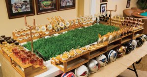 I see this one contains beer as I see it and other dishes. Still, I wonder if that grass is real. Looks like it compared to what I've seen on Cougar Mountain, that is. Also contains helmets from almost all the NFL teams.