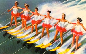 This is a poster of the Aquamaids (perhaps Aquaman's lady entourage) from Florida's Cypress Gardens. And yes, they're on this postcard for the fanservice. Still, the gardens are pretty enough so putting these women water skiing kind of unnecessary.