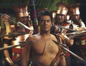 According to Neatorama, Victor Mature was the first Hollywood hunk. And it was during the premiere of Samson and Delilah, Groucho Marx would remark about him, "I can't enjoy any picture where the leading man's chest is bigger than the leading lady's."