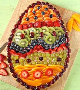 Now this is more of a dessert pizza with fruit toppings to decorate it over pink icing. Nevertheless, it's quite colorful.
