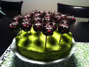 I like how all the groundhog cake pops are attached to this green cake, which I think is charming. Also, those groundhogs are quite cute if I do say so myself.