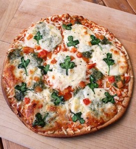 If it weren't for the red pepper bits, I could've sworn it was the same cheese pizza from 15 only baked. Also, those aren't real clovers.