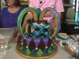 For a jester cake, this one seems quite sad and has a lot of stuff that isn't edible. Yet, it looks pretty cool though.