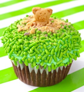 Well, of course, some of the crumbs serve as dirt as well but light soil means clay. Also, the cupcake is covered in green sprinkles for grass.