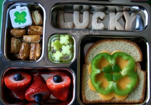 Now this includes some 4 leaf clover jello and a sandwich with a cheese and pepper 4 leaf shamrock design. Also has "LUCKY" spelled out in bread.