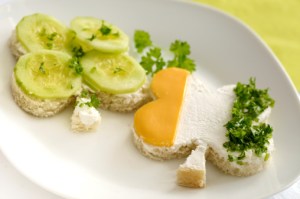 One consists of a parsley and cheese Irish flag while the other is of a cucumber 4 leaf clover.