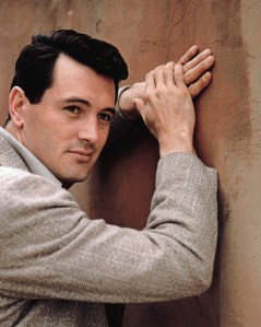 During the 1950s, Rock Hudson was a popular leading man with legions of female fans. However, we all know that he wasn't interested in any one of them since he was gay and would become the first major celebrity to die from AIDS. Also it was an open secret in Hollywood that his 3 year marriage to Phyllis Gates was a publicity stunt.