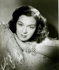 While Rosalind Russell played classy and glamorous roles, she never became a sex symbol in her long career playing professional women. In fact, some of her later roles like Mama Rose and Auntie Mame are especially iconic which earned her acclaim on Broadway and on the screen.