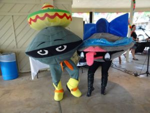 To be fair, St. Mary's Texas usual mascot is Rattleman which is a blue snake with his tongue sticking out. Shuckie and Pearl are just mascots for a campus event called the Oyster Bake. Nevertheless, as to why these exist, why one is upside down while the other wears a sombrero, and why a Texas college has an event like this at all, I don't have the slightest idea.