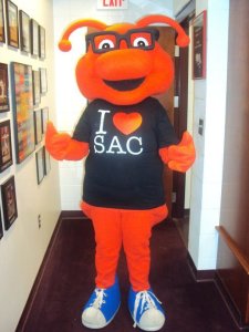 Basically he's the mascot of the college's Student Activities Council. Still, he looks more like Skeeter and Scooter's burned out brother with antennas than anything.
