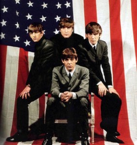 Gee, Beatles, this picture of the American flag seems all right with the union at the observer's left, but it's hung a little too low since the Fab Four are basically stepping on it. Then again, I'll just let them off this one since they're fantastic and British.