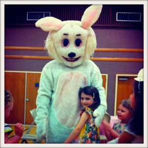 I don't like the look on that bunny's face. I mean it's just as if he wants to have her for dinner in the Donner Party sense. Seems like this little girl doesn't know what she's up against.