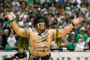 Okay, now I'm sure Hawaii has a lot of Polynesians in the area. But I can't help that he seems to embody the offensive savage native sacrifice your white women persona as I see it. I'm not sure if he's still the school's mascot or not.