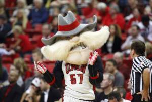 For one, having a Confederate mascot in Nevada makes absolutely no sense even if your team is named the rebels. Second, he looks as if he's Yosemite Sam's virulently racist old man when you look at the angry scowl and mustache. Third, is that blood on his hands?
