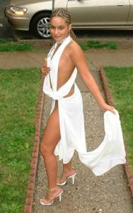 Let's just hope she's poorer than hen shit and wearing an actual bedsheet as a prom dress. Because I really don't want to think that her parents spent all this money on a dress that makes her seem like a slutty Grecian harem girl.