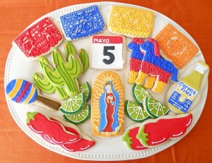 Now these cookies are of May 5th, pinatas, Mesoamerican temple art, cacti, maracas, chili peppers, limes, Our Lady of Guadelupe, and Corona. And I identified all that without consulting Wikipedia.