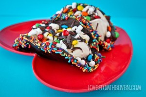 Now these consists of a chocolate covered waffle cone taco shell with ice cream, chocolate syrup, and M&Ms. All in all, this is a a taco sundae all smothered in chocolate. Yum!