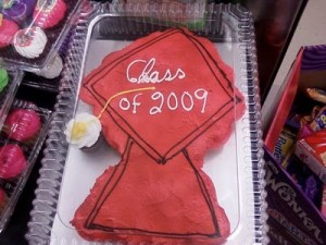 Yes, it's supposed to be a graduation cap. But it looks like a sign you'd see on the Interstate during roadwork season after school is out. At least if you live in Pennsylvania.