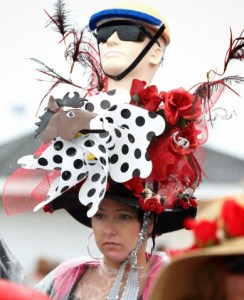 Hope this woman didn't get that head from her job at the DMV. Then again, she seems a bit too rich to have a job there from how that hat is decorated.