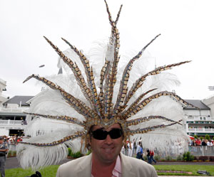 And the fact this hat is worn by a guy makes it even funnier. Seriously, he's bound to make Native American casino owners pissed off over cultural appropriation.