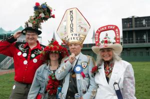 Nevertheless, Louisville's mayor has an ego about a mile wide. So on Kentucky Derby day, he thinks he's the Pope.