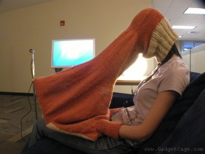 When your mom said that she wanted some private time to look on her laptop, this was probably not what she was talking about. Seriously, looks like she's been swallowed by a giant sock.