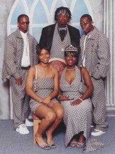 Good News: Looks like these people didn't spend a lot of money on their prom outfits. Bad News: Their clothes were made from the same material. Very Bad News: The fabric is ugly.