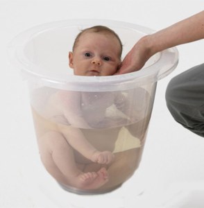 It's basically a bucket that costs $45 that's supposed to replicate the feeling of being in the womb. Nevertheless, if that does the trick, you should just hold on to your $45 and use a regular bucket, which comes with a handle.