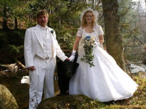 Four year old boys to carry rings? Gah! They have a black bear. Of course, having a black bear carry jewelry down the aisle does run the risk of having some of the guests eaten alive during the ceremony. Also, most churches don't allow pets, let alone wild animals for God's sake. Okay, maybe 4 year old ring bearers aren't such a bad idea.