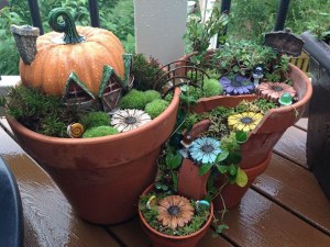 Now I'm sure the flowers aren't real but the foliage is. However, it's a perfect abode for small fairies, isn't it?