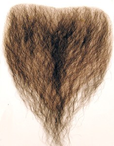 And I thought regular head toupees are stupid. If your dad sports a hairless chest, why don't you just encourage him to embrace it? Seriously, why does this thing even exist?