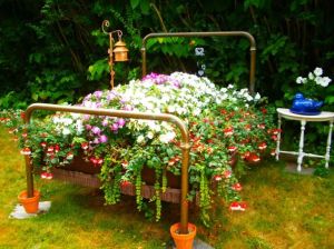 Now this one takes the concept of "flower bed" a bit more literally than most. Of course, it uses an actual metal bed.