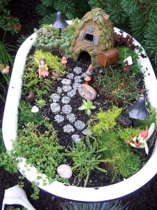 Now this seems like a perfect place for a pixie with cobblestone walks and a cute little house at the end. Maybe we need to use old bathtubs for planters more often.