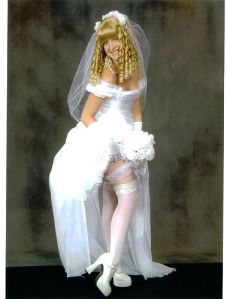 Then again, she could just be the childish stripper hired for the bachelor party. Still, the ringlets don't make this woman seem any more innocent.