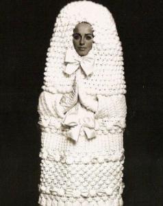 For God's sake, this outfit makes her look like a giant tampon! Perhaps this dress is better suited as a Public Service mascot costume that helps teach girls about feminine hygiene than a wedding. 