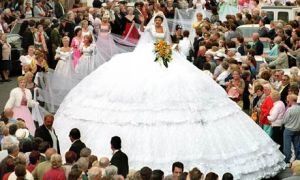 O my God, why would think of getting a wedding dress with skirt that big? Then again, perhaps it will be used for the happy couple's tent when they go on their honeymoon or something.