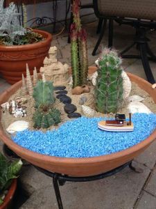 Didn't think you'd see cacti on the beach would you? By the way, I'm sure the seashells were real. Like the sand castle though.