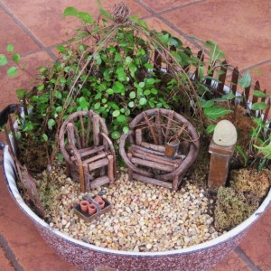 Now I like this kind of patio furniture. Quite rustic, I daresay. But I think the garden stuff and beehive is adorable.