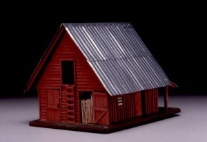 Now this seems almost like a model toy barn you'd see next to some antique doll's house. Still, I think I like the wooden rustic barn better. Aluminum makes it seem more industrial looking.