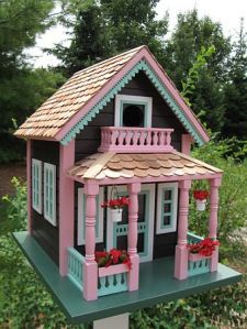 Now I wonder if I ever saw an actual house like this. Still, love the pink and baby blue on this house. They really stand out.