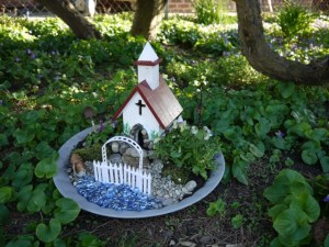 Now this seems like a lovely atmosphere to have a church, especially a wooden one. Love the little gate near the shore. Probably based on some rocky New England coastline.