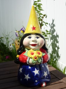 Unlike Wonder Woman, at least she doesn't wear skimpy outfits to kick ass. Also, she loves flowers, too. And she has a nice yellow cone hat.