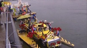 Of course, with the color scheme, I would've sworn it was more suited as a construction vehicle. And find the flowers and umbrella a very odd decorating scheme, indeed.