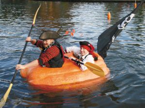 I think there's an actual regatta with pumpkin boats as far as I've seen on Google Images. Still, how they managed to find pumpkins this big to carve out, I'll never know.