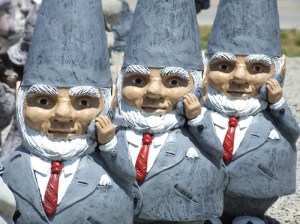 Nevertheless, you have to love how their cone hats go with their gray suits. Yet, I'm sure their workplace dress codes would want them to lose the hats and shave. Also like how they're on their cell phones.