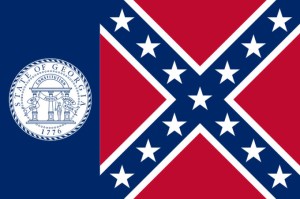 This was the state flag of Georgia from the 1950s to 2001. Its reason to have a Confederate flag on its emblem stems from the racist white legislators trying to send a message against desegregation. Luckily, it was replaced with a less racist design in 2001.