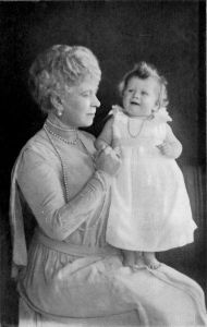 Here is the future queen on her grandmother Queen Mary's lap. Of course, she wasn't known to be a warm and fuzzy sort. More like a kleptomaniac and a jewel collector.