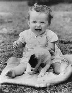Seemed to be such a smiley baby and loved puppies. Of course, she might've been quite the diva as well. Still, she'll grow up to be one of Hollywood's most illustrious actresses of all time.