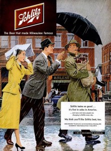 Now this guy better be planning a tailgate party or inviting his buddies to watch a game. Or else, he might have a drinking problem. And it seems that the other guy would rather use his umbrella to keep his buddy's beer bottles dry than his girlfriend who's had to wear a newspaper. What an asshole.